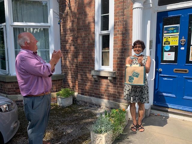 Shanti Rampal, Eliot House, receiving her gift from LinCA director Chris Bainborough